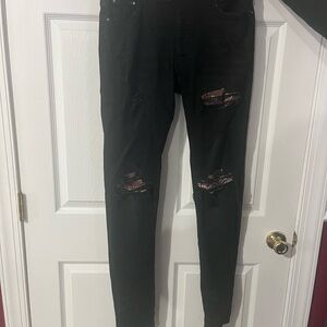 AMIRI Black Distressed Skinny Jeans